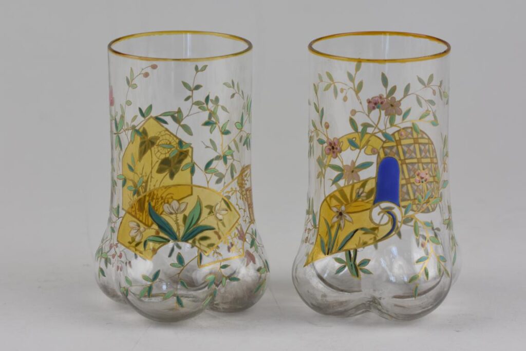 A pair of antique enamelled glass vases by Fritz Heckert
