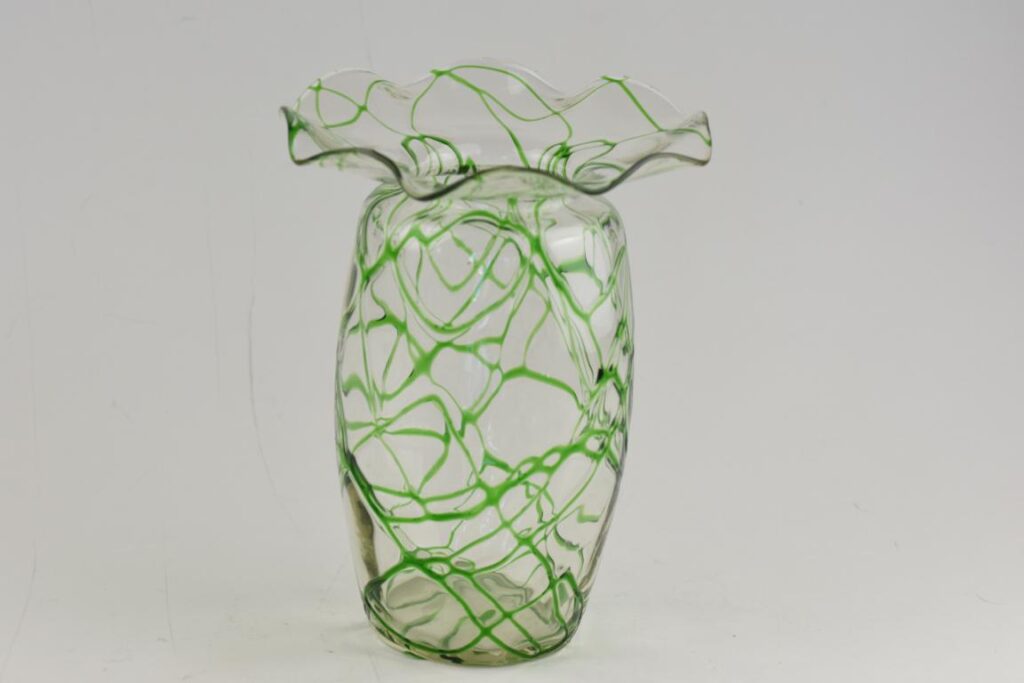 Antique English glass vase with green glass trails