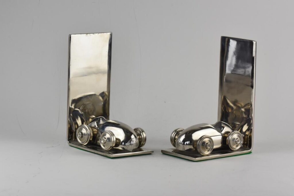 Art deco bookends in the style of Racing cars